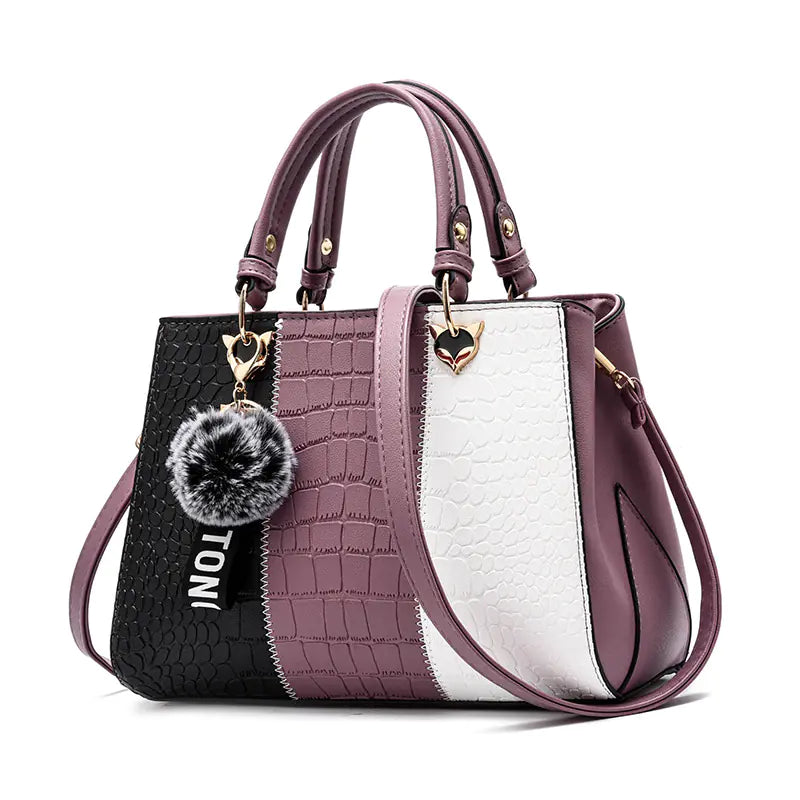 Contemporary women's shoulder bag featuring a lightweight design weighing just 083 kg