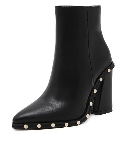 Comfortable synthetic wool insole inside black ankle boots for all-day wear