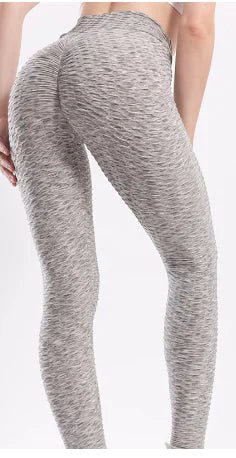 High waist peach-colored hip fitness leggings designed for comfortable workouts and stylish activewear