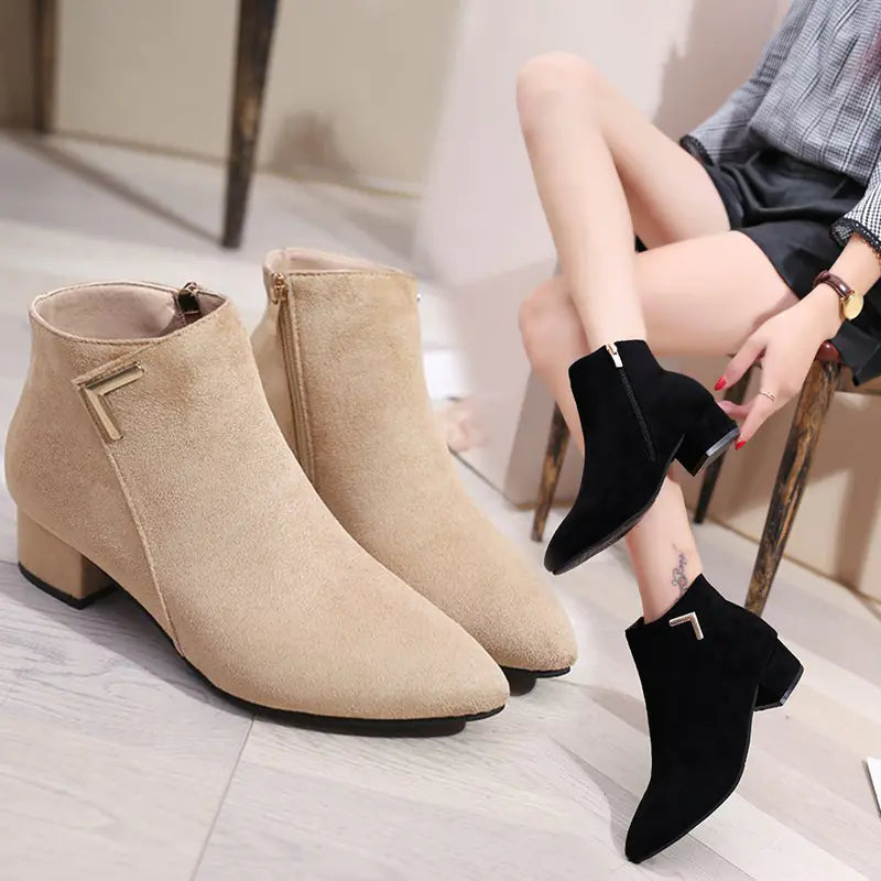Stylish pointed toe chunky heel ankle boots featuring a side zipper for easy wear and a modern, chic look