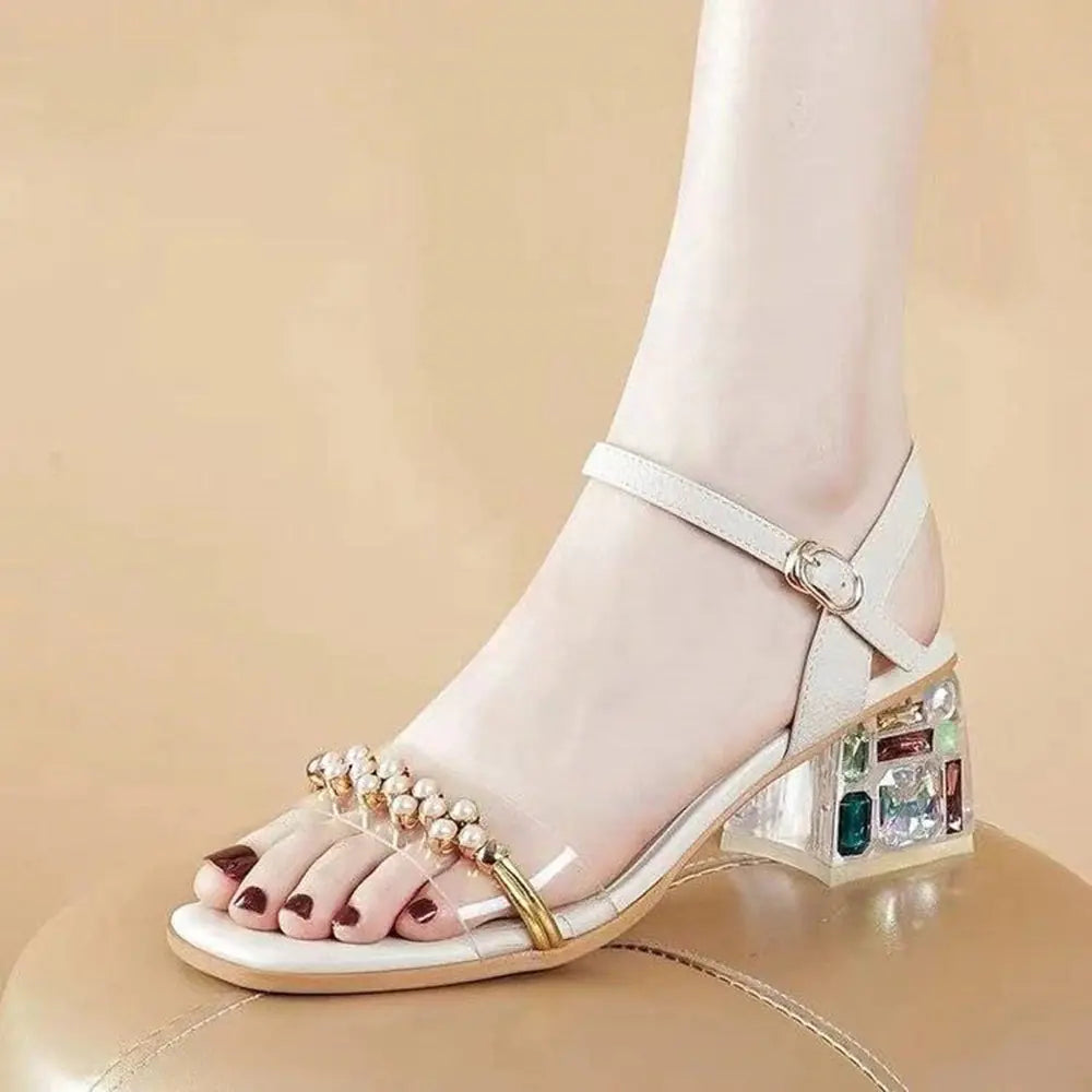 Elegant women's mid heel leather sandals featuring a thick square toe design for stylish comfort and versatile wear