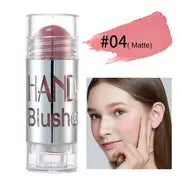 Cream blush stick with shimmery finish being applied to cheek for natural glow