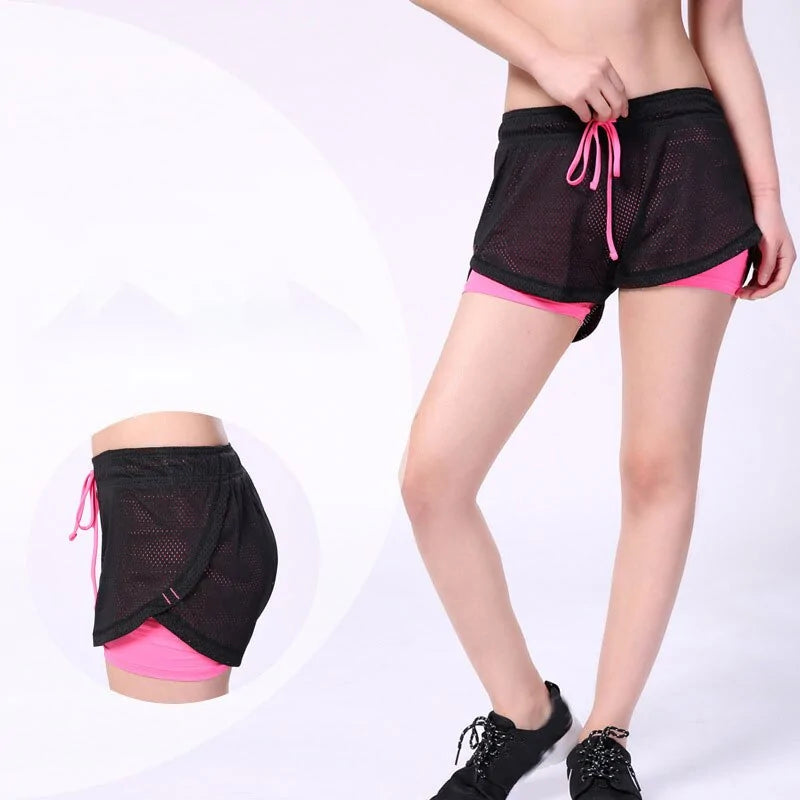 Women's yoga fitness shorts featuring elastic waist, breathable mesh panels, and comfortable running leggings for workout and activewear