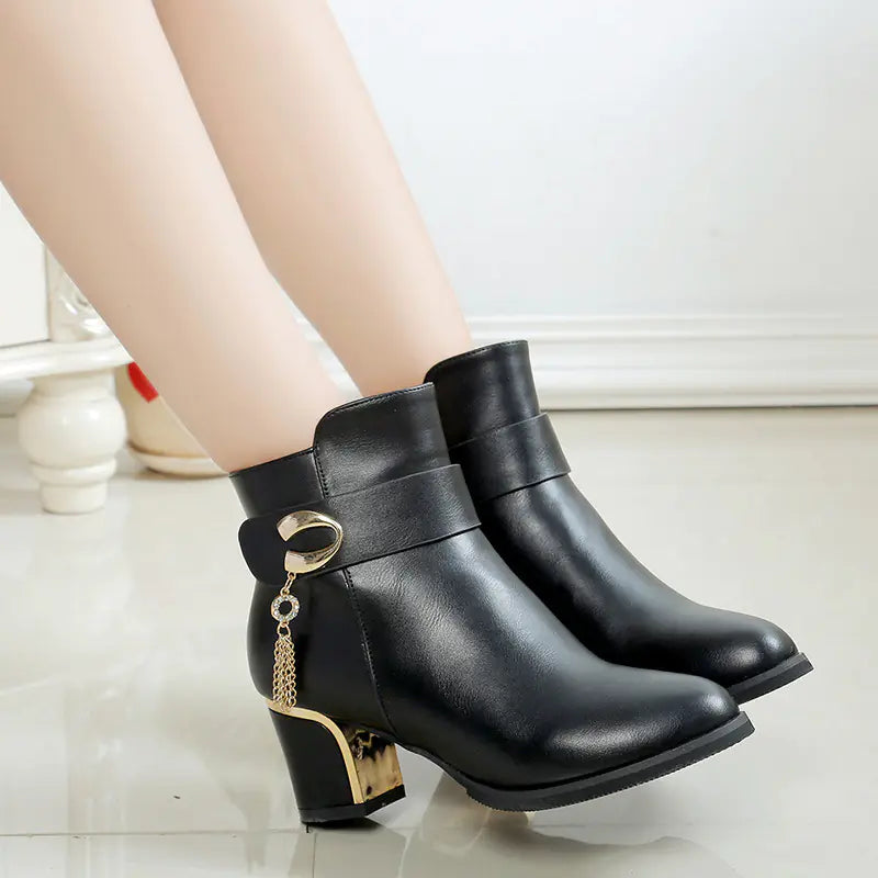 Elegant women's round toe high heel chunky ankle boots featuring stylish design and durable leather material for versatile fashion statements