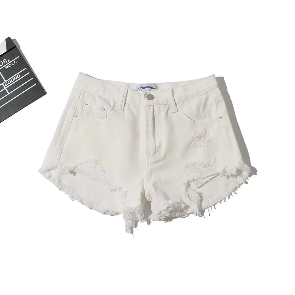 Stylish women's low waist denim shorts featuring fringe detailing and a trendy, casual summer look