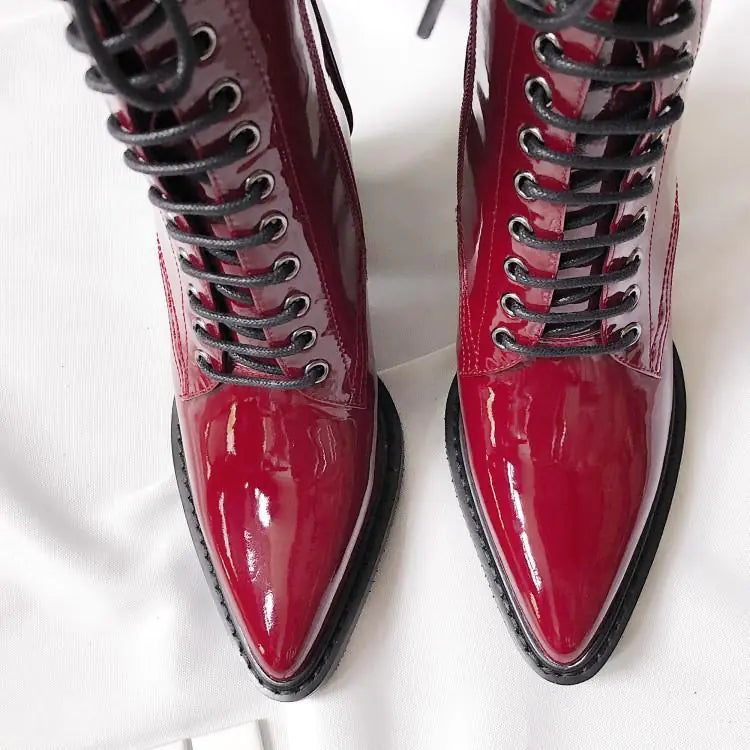 Elegant women's Martin boots featuring pointed toes, high heels, and sleek leather ankle design for stylish, sophisticated looks