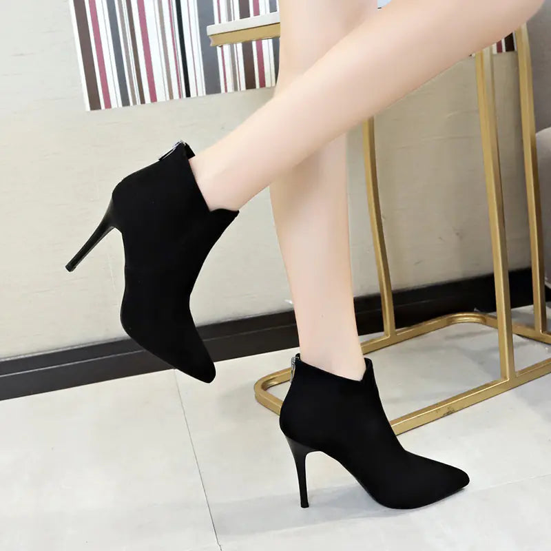Elegant pointed toe high heel boots with durable rubber sole and artificial wool lining