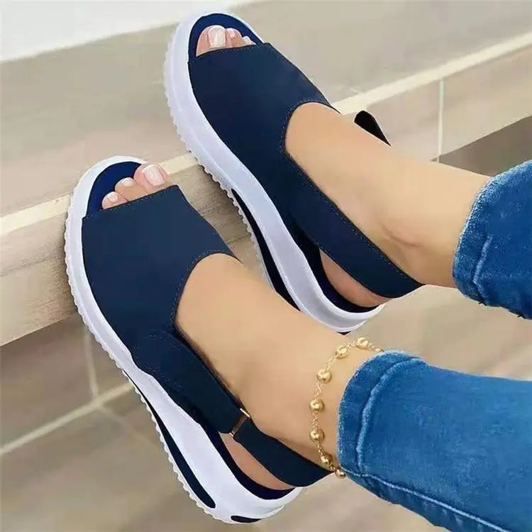 Elegant women's fish mouth sandals featuring a thick wedge heel for stylish comfort and support