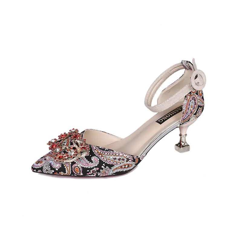Elegant red pointed toe stiletto heels adorned with sparkling rhinestones, perfect for bridal or formal occasions