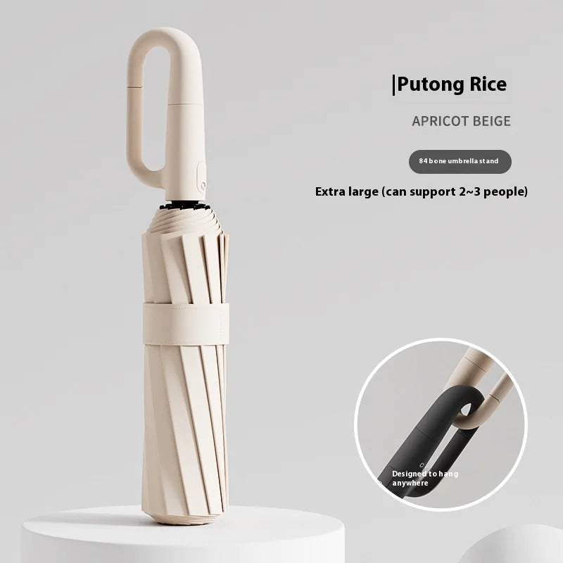 An 84 Frames Ring Buckle Umbrella featuring a stylish design with a durable frame and a unique ring buckle closure
