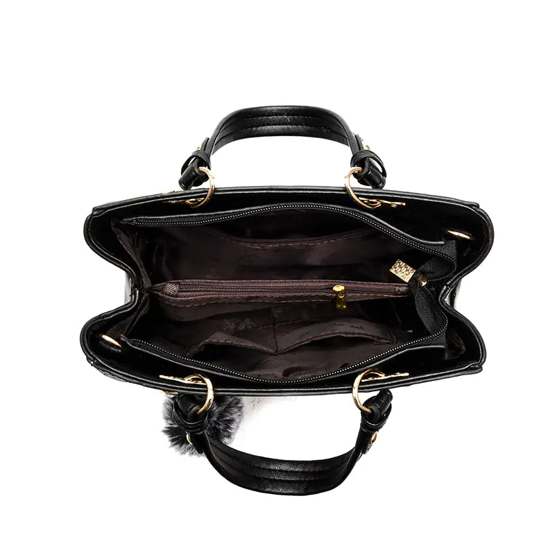Chic women's tote bag with a secure zipper opening and functional interior for essentials