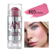 Chubby Blush Stick placed on a makeup table with a mirror and brushes nearby