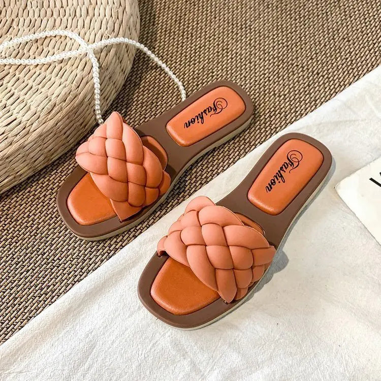 Elegant women's summer flat sandals featuring square toes and intricate woven straps for breathable, stylish comfort