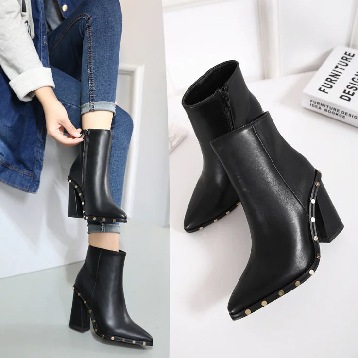 Close-up of side zipper and sleek low cylinder design on stylish ankle boots