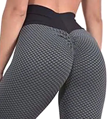 A pair of Honeycomb Peach Jacquard High Waist Yoga Leggings featuring intricate textured pattern and flattering fit for activewear and fitness activities