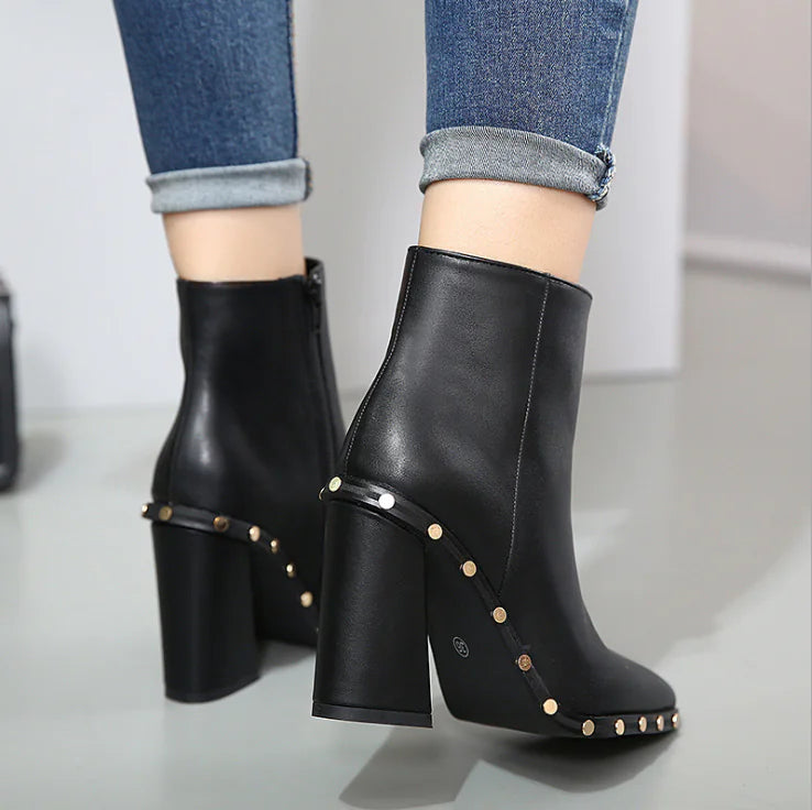 Side profile showing sturdy chunky heel and ankle height for added height