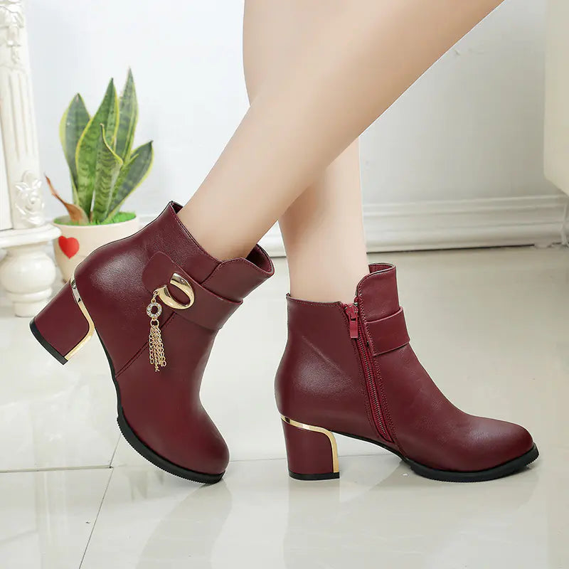 Elegant women's round toe high heel ankle boots with chunky heels and stylish design for fashionable footwear