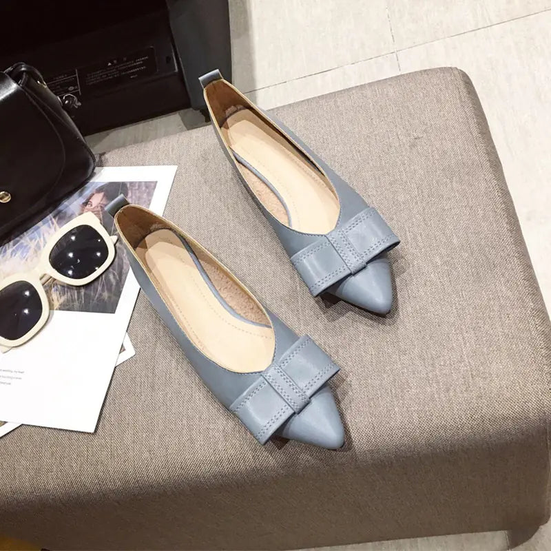 Blue high heel Mary Jane shoes with a sleek pointed toe and stable thick heel for versatility