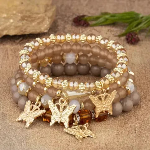 Colorful Butterfly Bliss Beaded Bracelets featuring intricate beadwork and delicate butterfly charms for a charming, bohemian accessory look