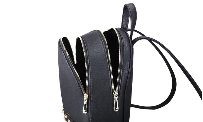Chic black mini backpack with dual shoulder straps, perfect for active women on the go