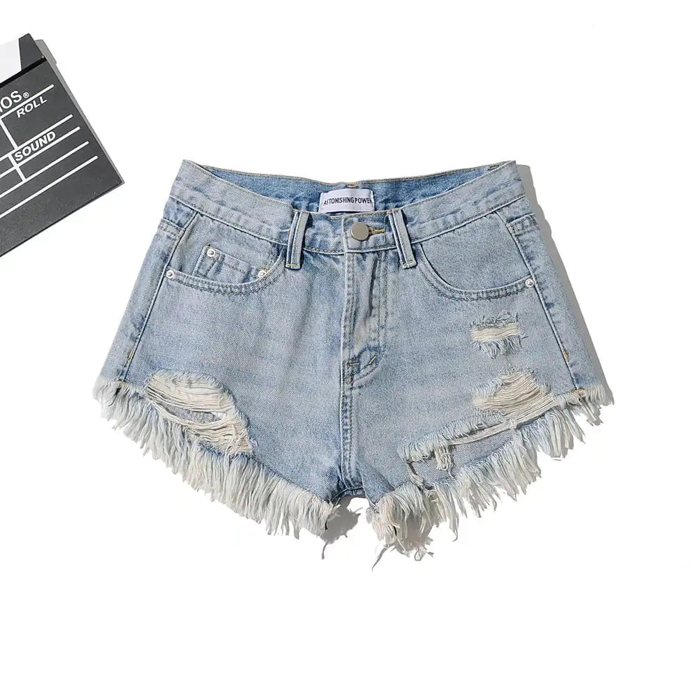 A stylish pair of women's low waist denim shorts featuring fringe detailing along the hem, perfect for casual summer outings and beachwear, showcasing a trendy, relaxed fit with distressed accents and classic five-pocket styling