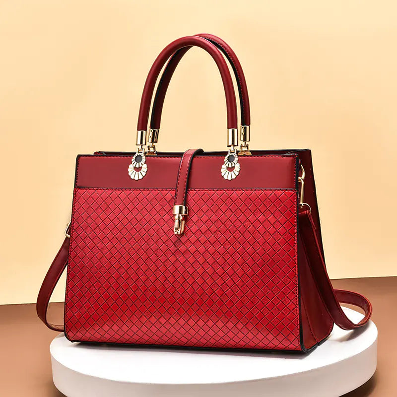 Red women's handbag showcasing large capacity and trendy design with soft surface finish