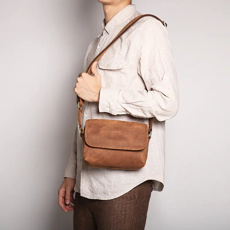 Black vintage leather shoulder bag suitable for work, school, or casual outings