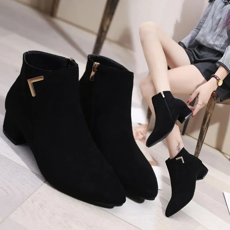 Stylish pointed toe chunky heel ankle boots featuring a side zipper for easy wear and a modern fashion statement
