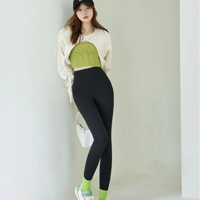 High waist hip lifting belly contracting leggings showcasing a sleek, sculpting fit for enhanced curves and support