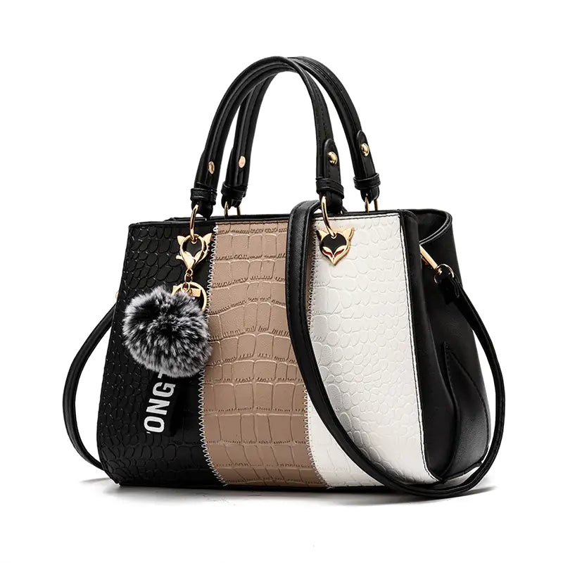 Elegant women's shoulder tote bag with sleek modern design and durable hard handle