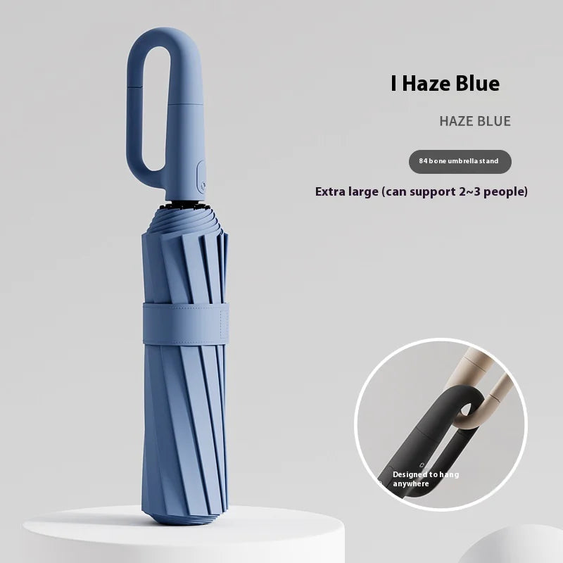 A stylish 84 frames ring buckle umbrella featuring a durable design and vibrant canopy for rainy weather protection