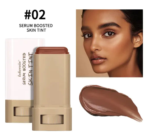 A close-up of a sleek, pink glow blush stick with shimmering finish for radiant cheeks