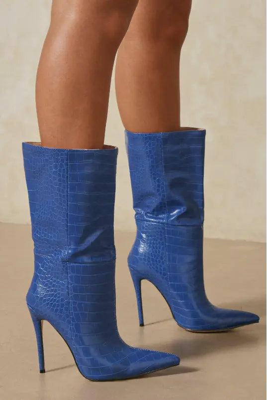 Elegant crocodile leather high heel ankle boots featuring a sleek design, pointed toes, and stylish stiletto heels perfect for sophisticated fashion statements and upscale occasions