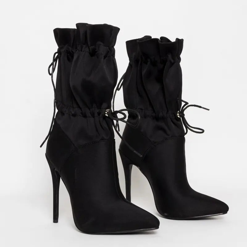 Elegant mid-calf high heel pointed toe boots for women, stylish and versatile footwear perfect for chic outfits and sophisticated occasions