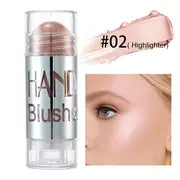 Close-up of the creamy blush texture being gently blended into the skin for a seamless look