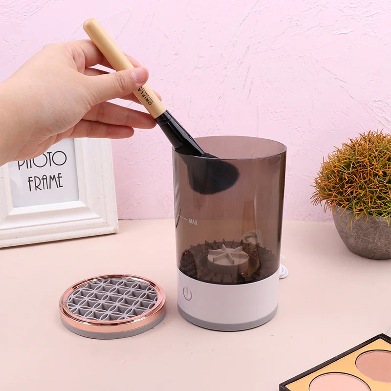 Portable makeup brush cleaning device with rechargeable battery, perfect for on-the-go use