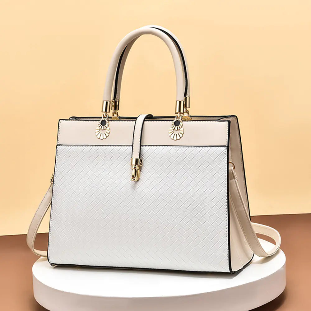 Yellow women's handbag with spacious interior, lace and leather elements, perfect for daily use
