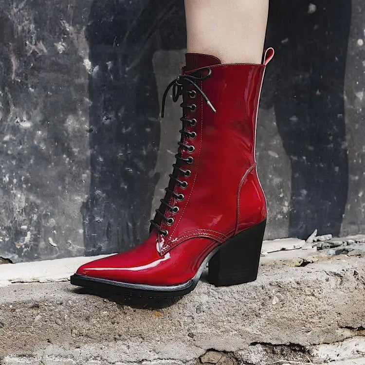 Elegant women's Martin boots featuring pointed toe design, high heels, and sleek leather ankle styling for fashionable and versatile footwear