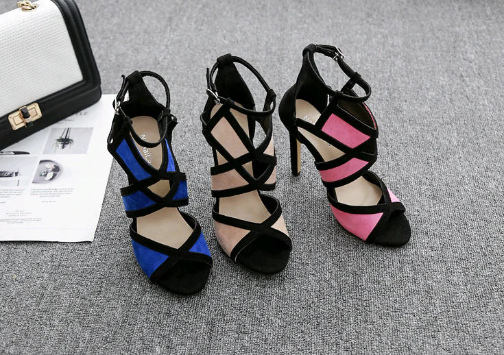 Luxurious women's high heels featuring a cross strap design and a stylish hollow buckle for a contemporary look