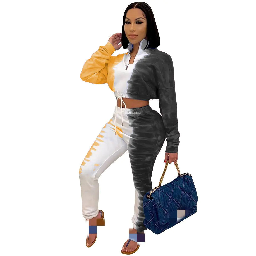 Flat lay of the casual printed stretch sweatshirt and pencil pants in both red and grey colors, emphasizing versatility
