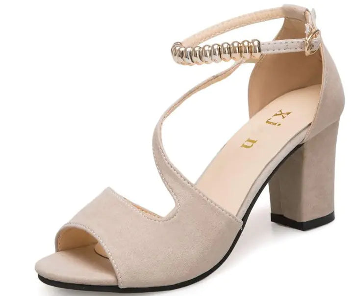 Elegant women's fashion sandals featuring a thick mid-heel and stylish buckle detail for trendy summer wear