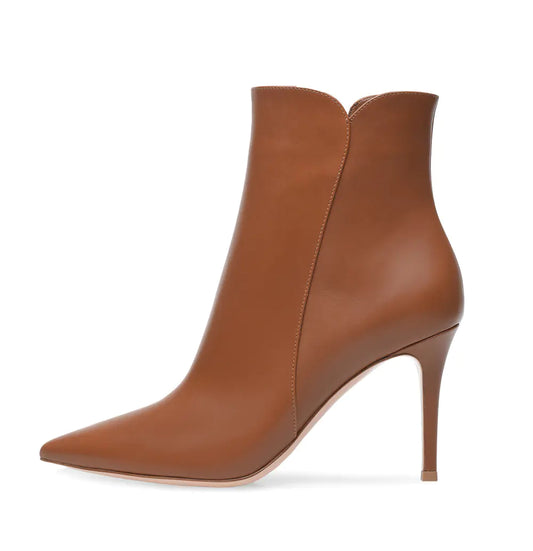 Elegant women's super high heel pointed toe ankle boots showcasing stylish design and premium materials for fashionable footwear