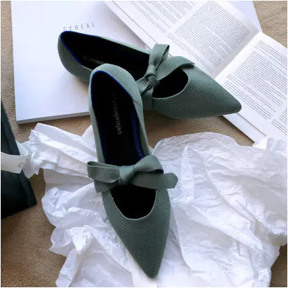 Elegant flat casual boat shoes featuring a bow and Mary Jane style for stylish comfort