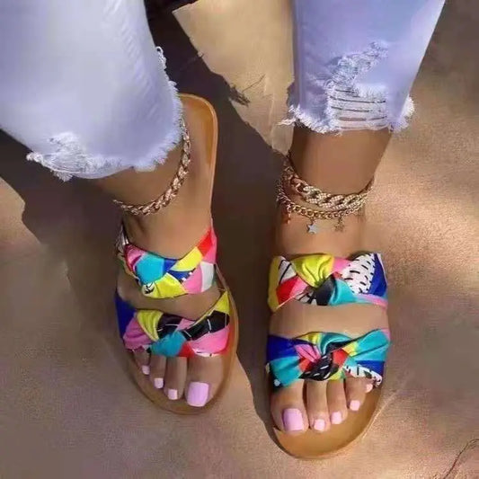 Women's Bowknot Toe Flat Sandals with vibrant red flower color showcasing stylish design