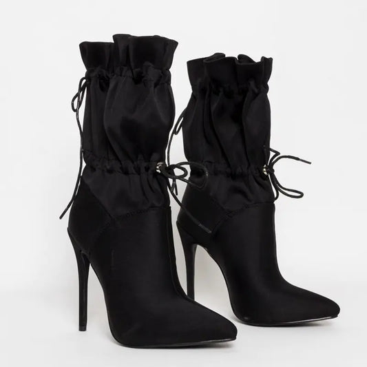 Elegant mid-calf high heel pointed toe boots for women with stylish leather finish and sleek design