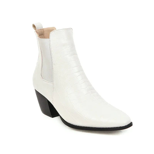 Elegant pointed toe ankle boots featuring a stylish stone pattern, chunky heel, and sleek design for fashionable outings