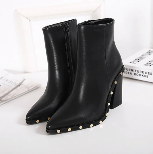 Elevated style with black studded pointed toe chunky heel ankle boots